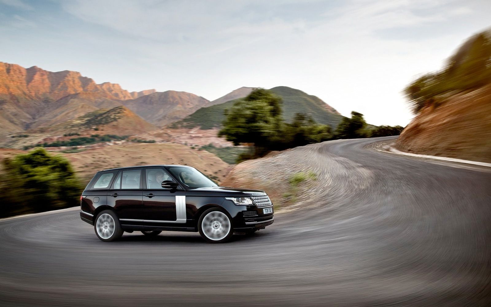 2015 Range Rover in black on a winding road