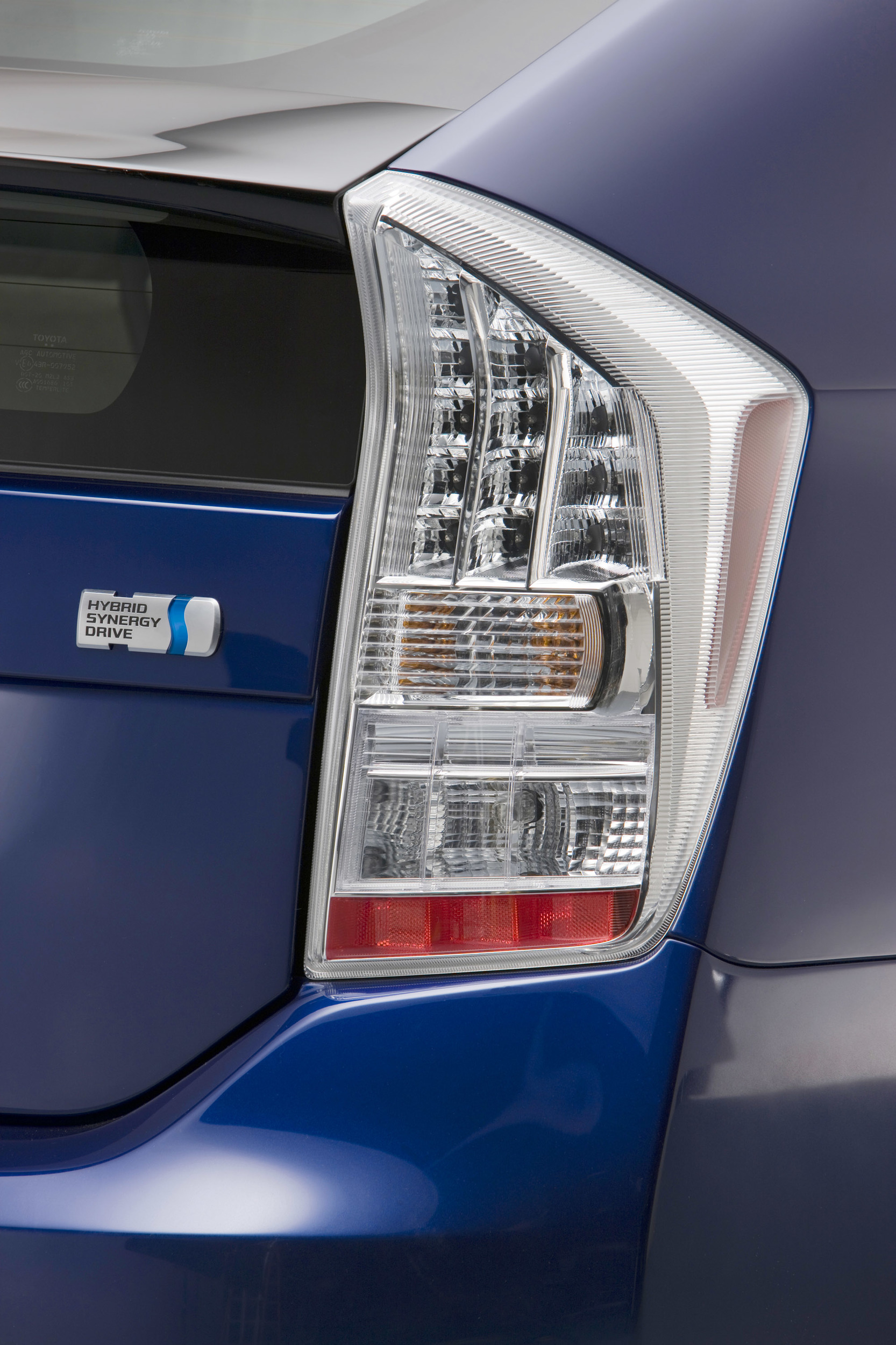 Toyota Prius tail light and hybrid badge