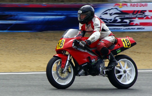 Ely Schless aboard the Proto Moto entry exits the corkscrew at Laguna Seca