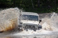 AEV Jeep Wrangler Hemi driving through water