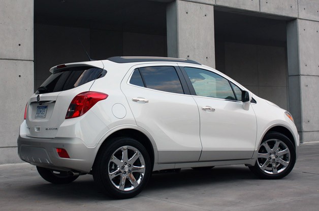 2013 Buick Encore - rear three-quarter view, white