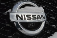 Snow-covered Nissan badge on long-term 2013 Pathfinder