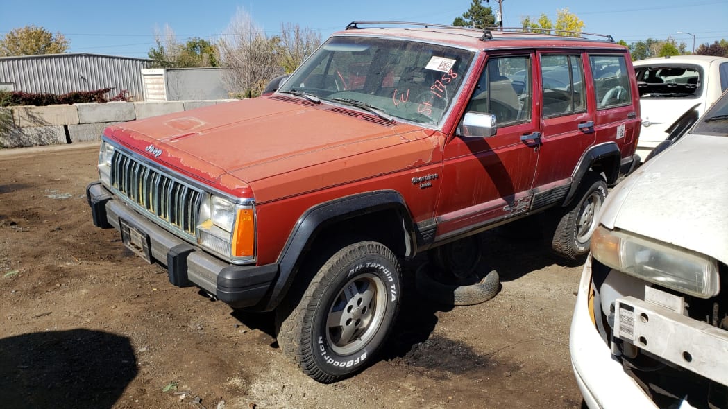 31 - 1990 Jeep Cherokee XJ in Colorado junkyard - photo by Murilee Martin