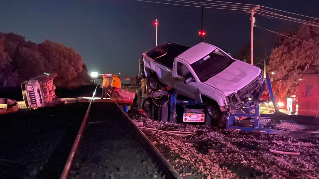 Watch vehicles go flying in terrifying train crash with car hauler - Haber  Ahali