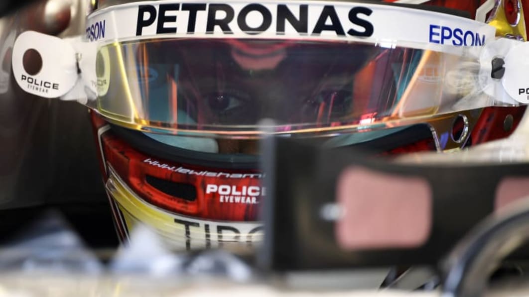 Lewis Hamilton takes pole position at German GP as Ferrari falters ...