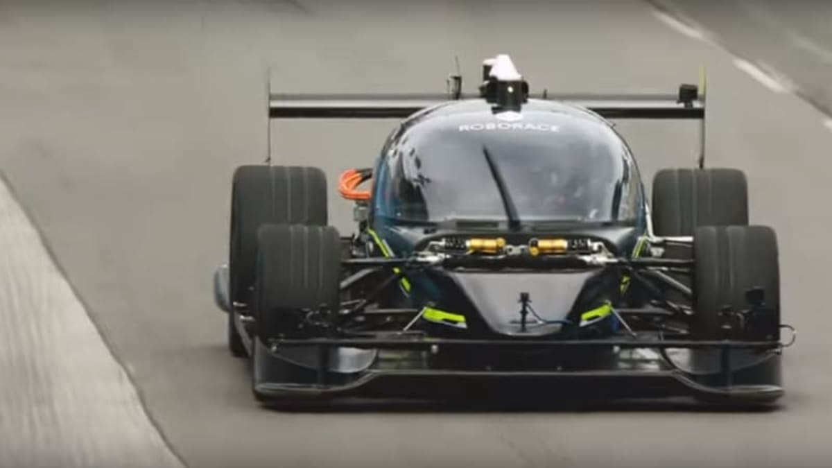 Roborace self-driving race car vs. professional driver for fastest time ...
