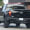 black 2017 ford f-150 raptor spy shot crew cab profile rear with exhaust