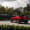 The Scion C-HR concept shown off in red for the LA Auto Show, rear three-quarter.