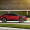 The Scion C-HR concept shown off in red for the LA Auto Show, side view.