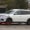 white 2017 nissan pathfinder spy shot camouflaged nose and rear
