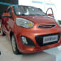 Yogomo 330 EV (Chinese clone of Kia Picanto), orange, front three-quarter