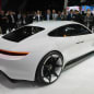 The Porsche Mission E concept, showed off at the 2015 Frankfurt Motor Show, rear three-quarter view.