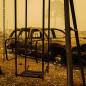 A charred swing set and car are seen after the passage of the Santiam Fire in Gates, Oregon, on September 10, 2020. - California firefighters battled the state's largest ever inferno on September 10, as tens of thousands of people fled blazes up and down the US West Coast and officials warned the death toll could shoot up in coming days. At least eight people have been confirmed dead in the past 24 hours across California, Oregon and Washington, but officials say some areas are still impossible to reach, meaning the number is likely to rise. (Photo by Kathryn ELSESSER / AFP) (Photo by KATHRYN ELSESSER/AFP via Getty Images)