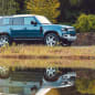 2020 Land Rover Defender blue reflection front 34