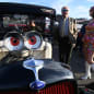 Motoring enthusiasts attend the Goodwood Revival, a three-day historic car racing festival in Goodwood, Chichester, southern Britain, September 17, 2021. REUTERS/Toby Melville