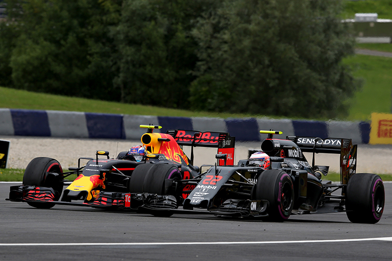  Max Verstappen of the Netherlands driving the (33) Red Bull Racing Red Bull-TAG Heuer RB12 TAG Heuer battles with Jenson Button of Great Britain driving the (22) McLaren Honda Formula 1 Team McLaren MP4-31 Honda RA616H Hybrid turbo on track during the Formula One Grand Prix of Austria at Red Bull Ring on July 3, 2016 in Spielberg, Austria.