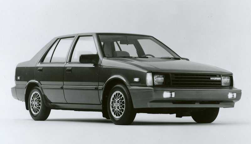 The 1986 Hyundai Excel, front three-quarter view.