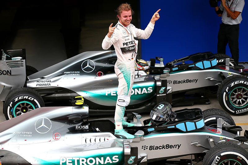 Nico Rosberg stands atop his car after winning the 2015 Brazilian Grand Prix.
