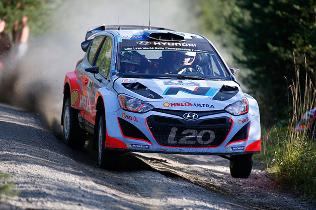 A Hyundai i20 WRC takes a corner in the Neste Oil Rally Finland.