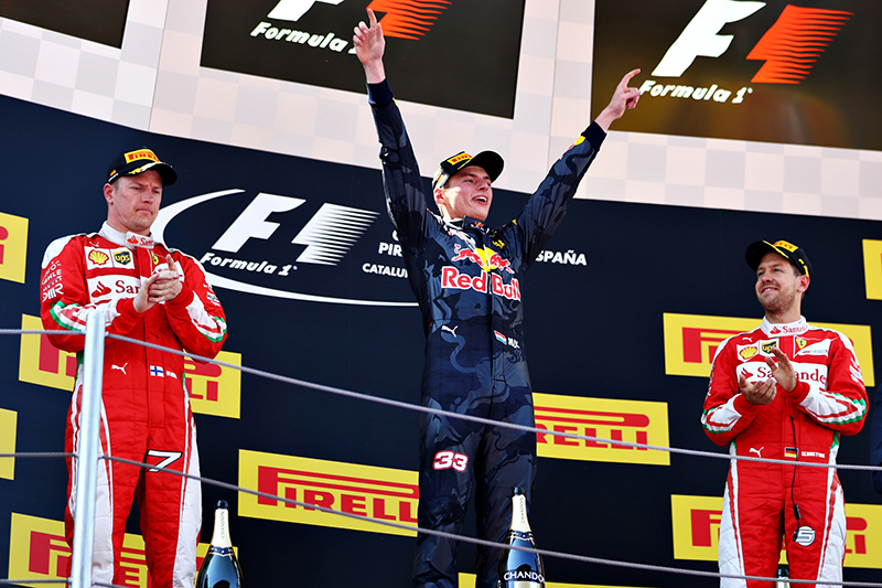 Max Verstappen of Netherlands and Red Bull Racing celebrates his first F1 win on the podium with Kimi Raikkonen of Finland and Ferrari and Sebastian Vettel of Germany and Ferrari during the Spanish Formula One Grand Prix