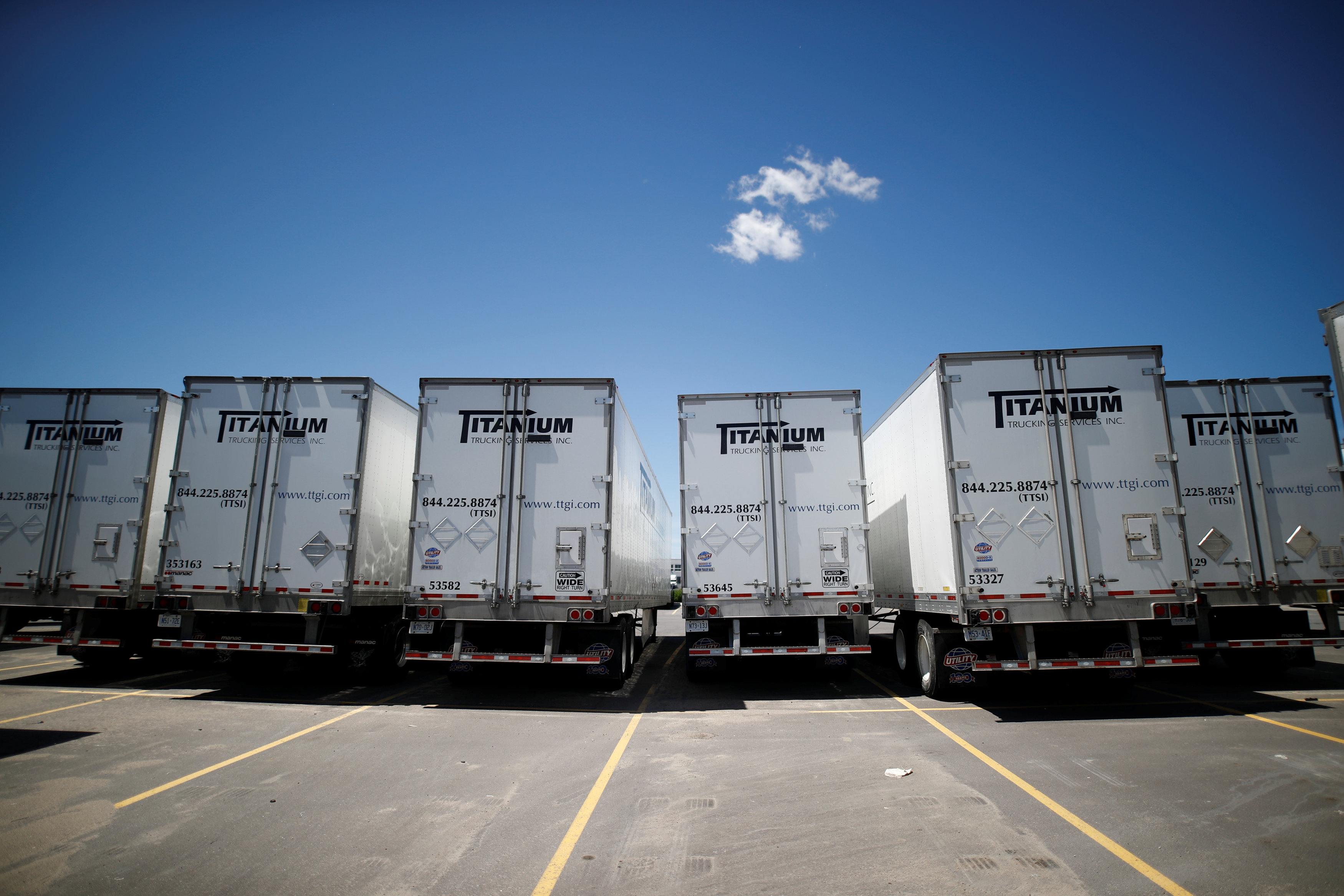 Trailers sit in a lot equipped with "BlackBerry Radar" boxes, that perform a fleet-tracking service which uses $400 boxes to collect and transmit information on movement, temperature and physical contents of truck trailers, at the Titanium Transportation trucking firm in Bolton, Ontario, Canada on June 7, 2017. Picture taken on June 7, 2017.    REUTERS/Mark Blinch