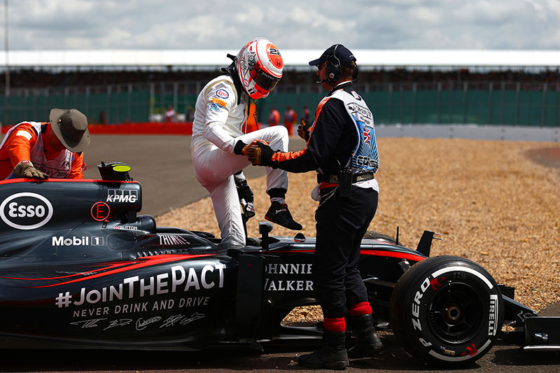 Jenson Button's race ends early at the 2015 British Grand Prix.