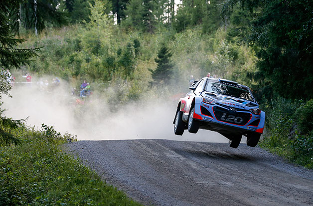 Haydon Pannon takes a jump in his Hyundai i20 WRC in the Neste Oil Rally Finland.