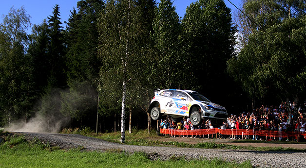 A Volkswagen Polo R WRC takes a jump in the Neste Oil Rally Finland.