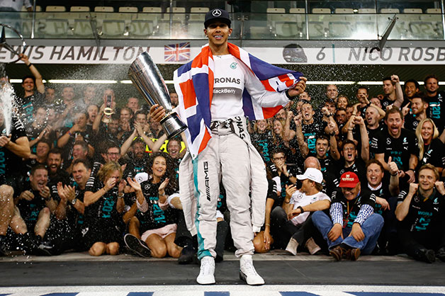 Lewis Hamilton celebrates winning the Driver's Championship at the end of the 2014 Abu Dhabi F1 Grand Prix.