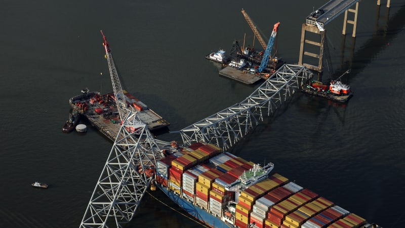 work continues at the collapse site of the francis scott key bridge