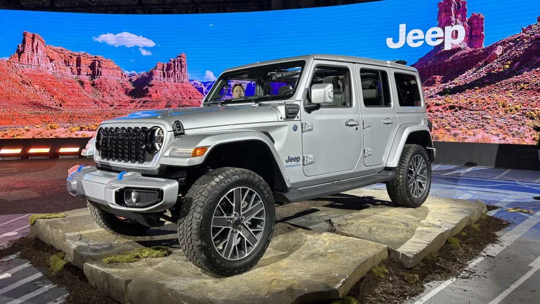 The UAW document says the Jeep Wrangler EV is scheduled to launch in 2028, and “midsize trucks” in 2027.