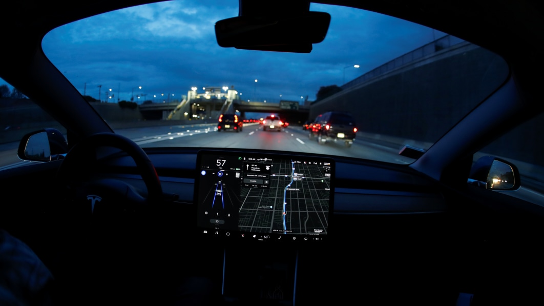 a_model_3_tesla_vehicle_navigates_morning_rush_hour_using_the_car_s_auto_pilot_feature_in_los_angeles.jpeg
