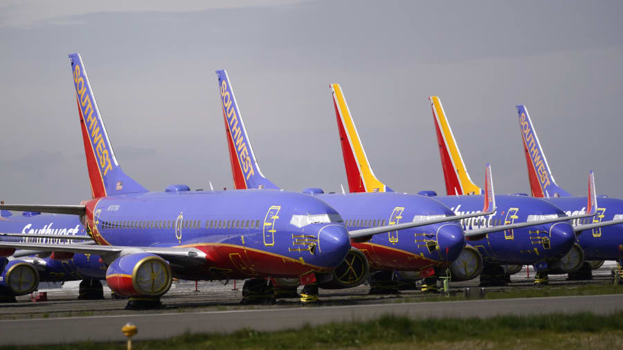Southwest posts a 1Q loss and will limit hiring, offer voluntary leave to staff and drop 4 airports
