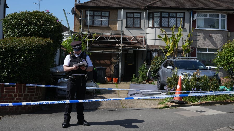 Man arrested in London over sword attack that left a child dead