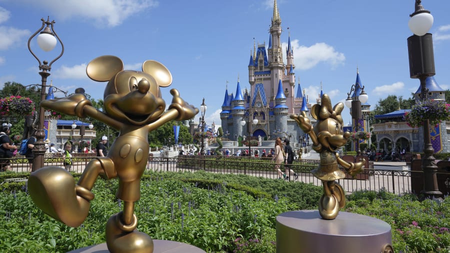 At Disney World, adult visitors increasingly mix remote work and play