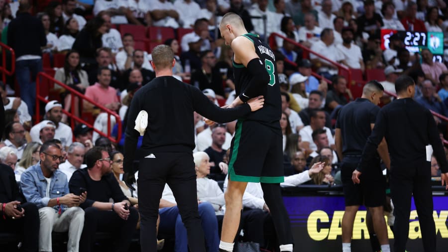 Celtics cruise to Game 4 win over Heat, lose Kristaps Porzingis to calf injury