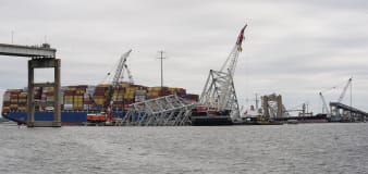 First cargo ship passes through newly opened channel in Baltimore since bridge collapse