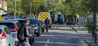 UK police arrest man wielding sword after he attacked people in east London