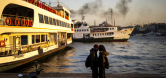 AP PHOTOS: Voters to turn a new page in the history of Istanbul, guardian of the Bosphorus