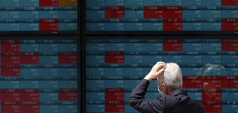 Stock market today: Global markets wobble after Fed sticks with current interest rates