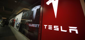 Tesla shares tumble below $150 per share, giving up all gains made over the past year