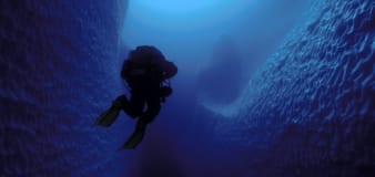 Photos show what cave divers discovered when they swam inside an iceberg the size of Jamaica. Today it's gone