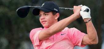 Charlie Woods shoots career-best round to win junior golf tournament – with dad Tiger on the bag