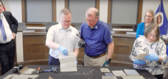 High school official discovers century-old time capsule during demolition of old building