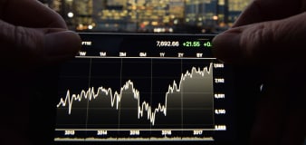 FTSE 100 hits all-time high as shares rally holds strong