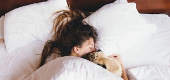 A quarter of women would rather sleep next to a pet than a partner