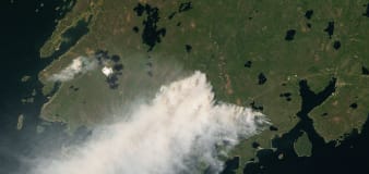 Canadian wildfires rage, impacting US air quality 