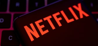Netflix stock sinks on disappointing revenue forecast, move to scrap membership metrics
