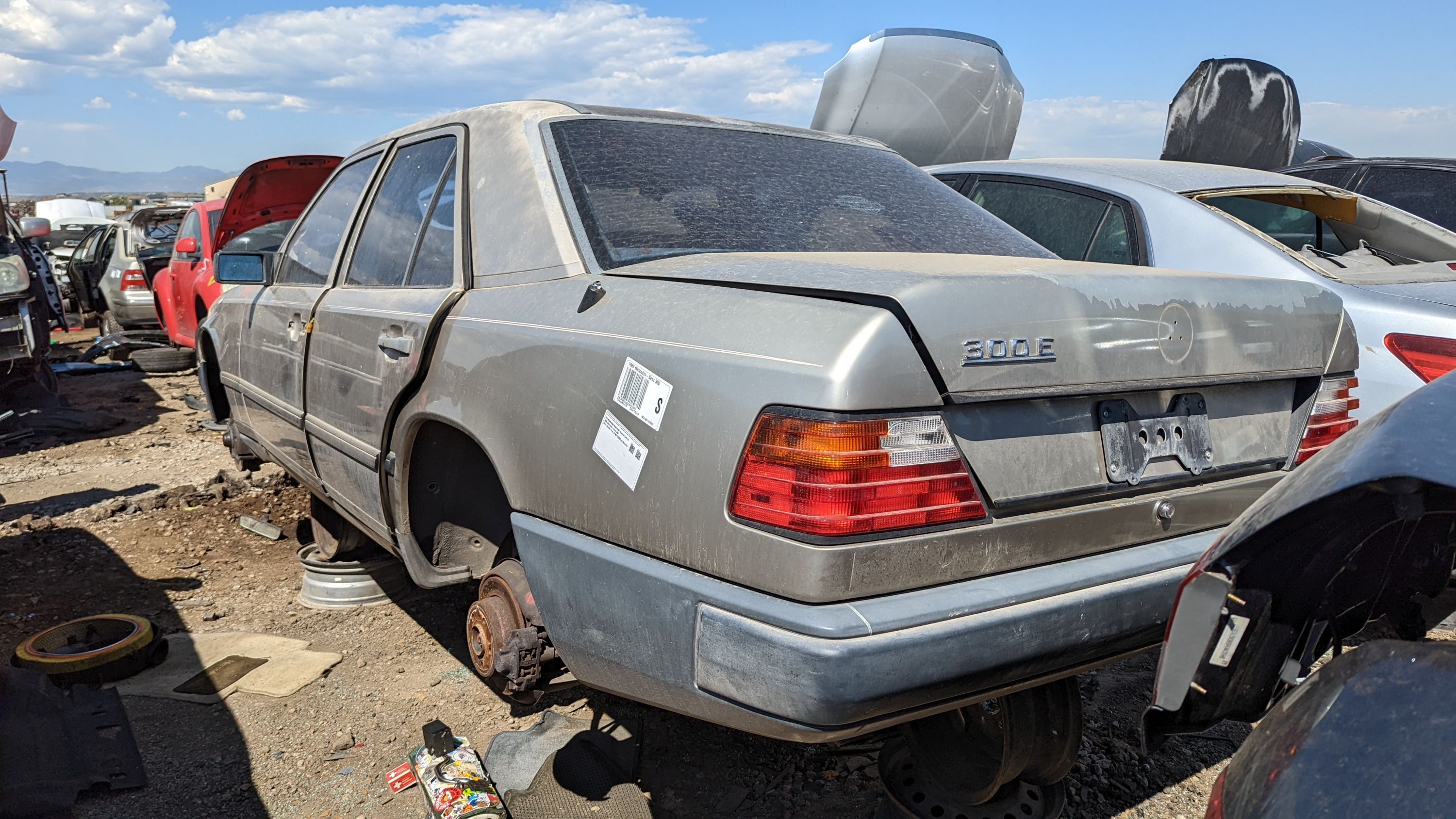 30 - 1989 Mercedes-Benz 300E W124 in Colorado junkyard - photo by Murilee Martin