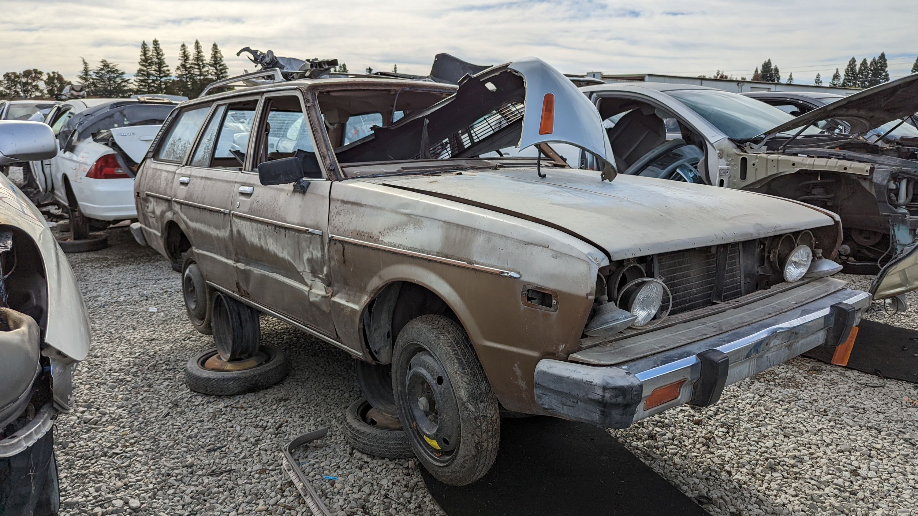 99 - 1978 Datsun 510 wagon in California junkyard - photo by Murilee Martin